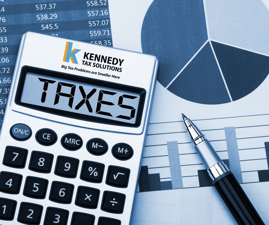 calculator showing TAXES on the display screen, Kennedy Tax Solutions logo and slogan
